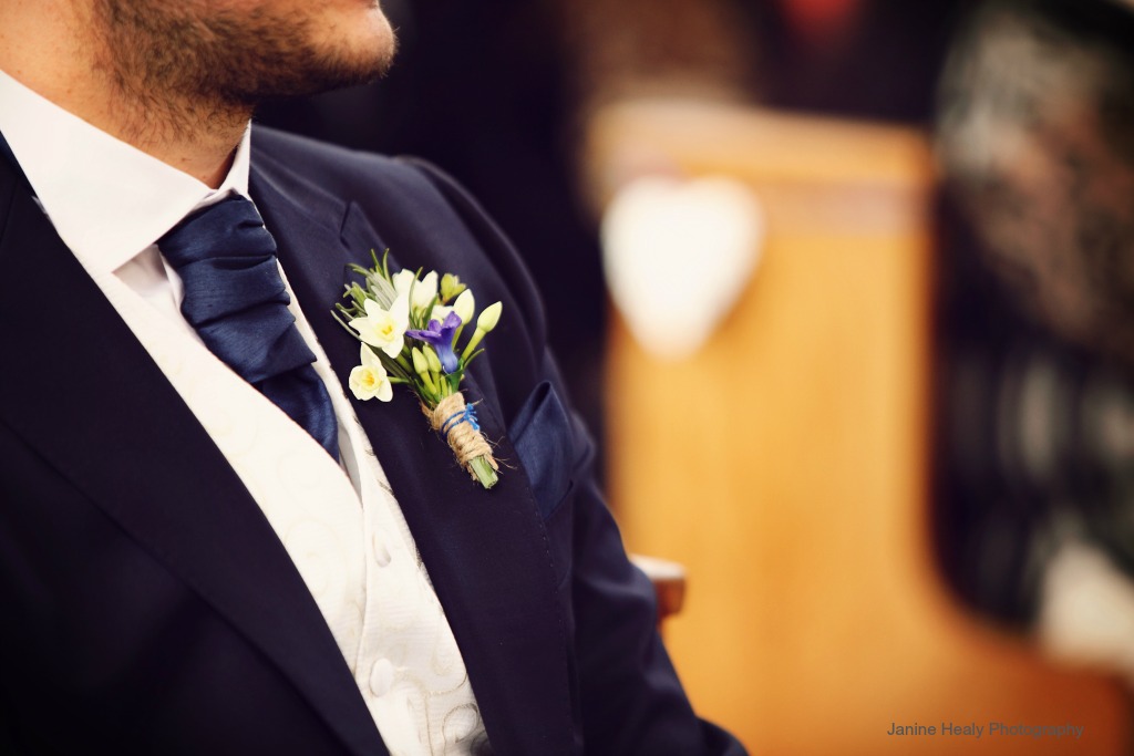 A wedding buttonhole for spring with narcissi and hyacinth pips. Bound with twine and embroidery silk.